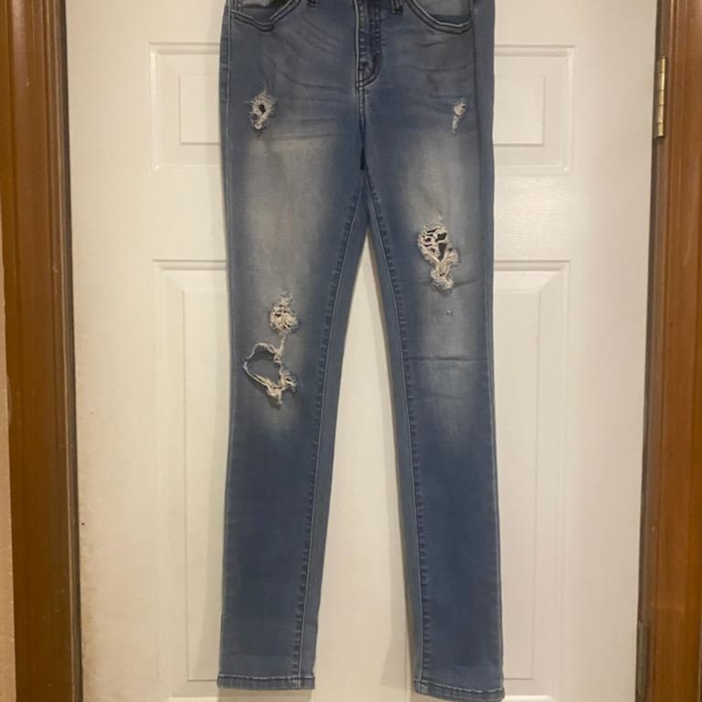 Women's Distressed Blue Jeans